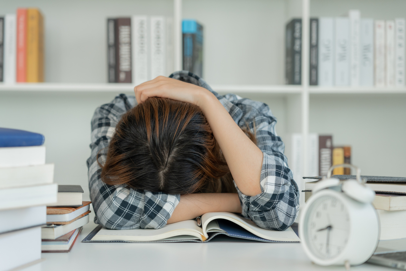 Asian student woman have anxiety because of exams, female prepar